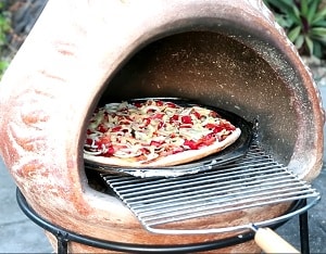 chiminea with grill and pizza stone